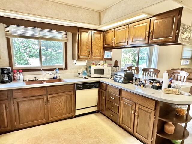 52 S 950 E, Greentown, IN 46936 - kitchen with white appliances, a sink, a peninsula, open shelves, and plenty of natural light