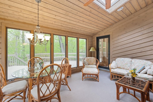 55961 Dana Dr, Bristol, IN 46507 - sunroom with a skylight, healthy amount of natural light, vaulted ceiling, a chandelier, and carpet floors