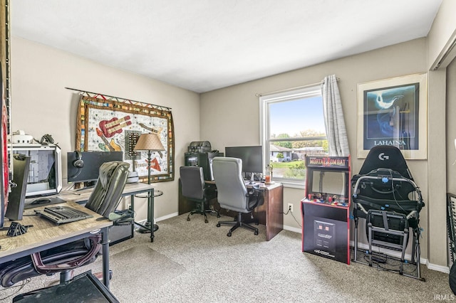 office space featuring baseboards and carpet