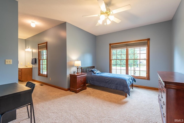 bedroom with carpet floors, baseboards, and a ceiling fan