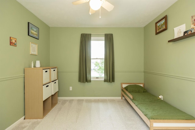 14375 Pheasant Ct, Mishawaka, IN 46545 - bedroom with light carpet, baseboards, and ceiling fan