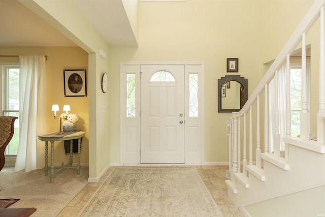 14375 Pheasant Ct, Mishawaka, IN 46545 - foyer entrance with stairs and baseboards