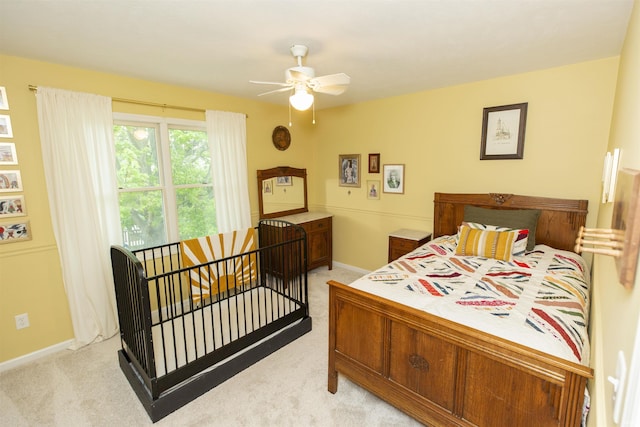 14375 Pheasant Ct, Mishawaka, IN 46545 - bedroom with light colored carpet, baseboards, and ceiling fan