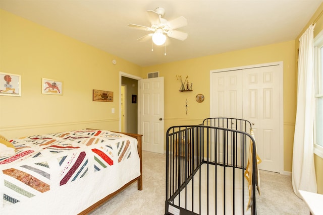 14375 Pheasant Ct, Mishawaka, IN 46545 - bedroom featuring light colored carpet, a closet, and a ceiling fan
