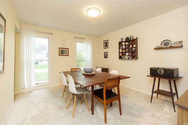 14375 Pheasant Ct, Mishawaka, IN 46545 - dining area with light carpet and baseboards