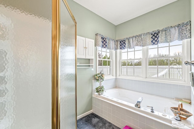 3700 Saint Andrews Pl, Elkhart, IN 46517 - full bathroom featuring a garden tub and baseboards