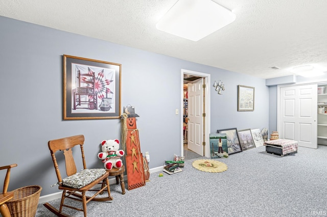 3700 Saint Andrews Pl, Elkhart, IN 46517 - living area with carpet floors, a textured ceiling, and baseboards