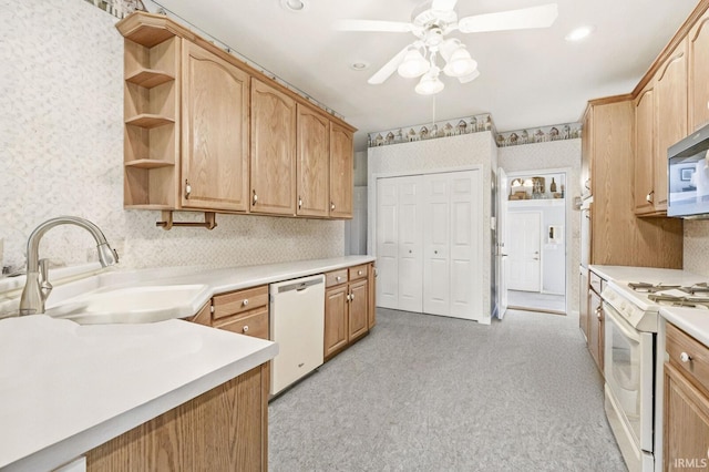 3700 Saint Andrews Pl, Elkhart, IN 46517 - kitchen with white appliances, wallpapered walls, a sink, open shelves, and ceiling fan