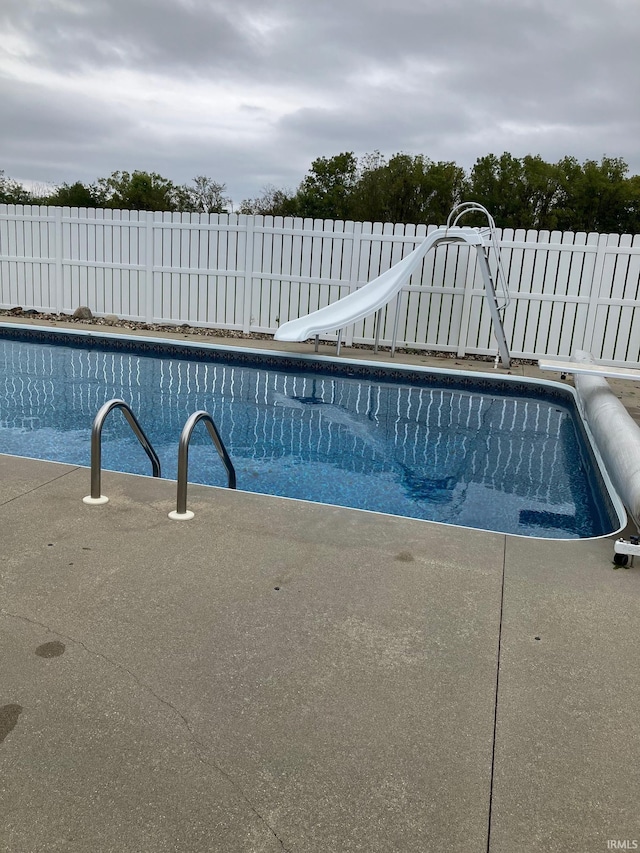 3700 Saint Andrews Pl, Elkhart, IN 46517 - view of pool featuring a water slide and fence