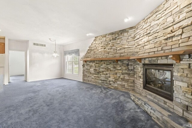 3700 Saint Andrews Pl, Elkhart, IN 46517 - unfurnished living room with carpet floors, a glass covered fireplace, and baseboards