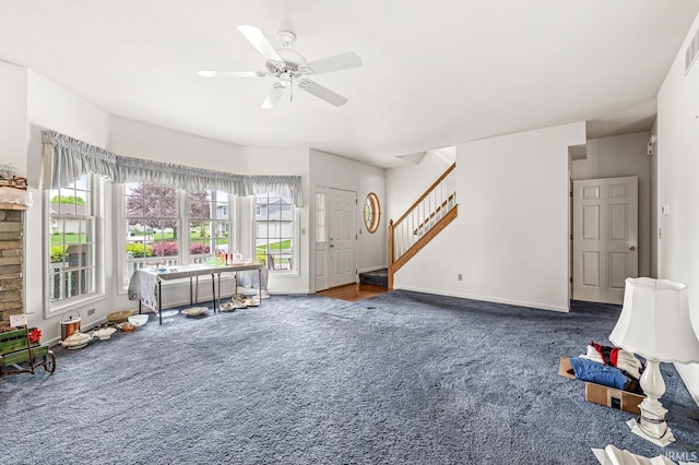 3700 Saint Andrews Pl, Elkhart, IN 46517 - living room featuring carpet, stairs, baseboards, and a ceiling fan