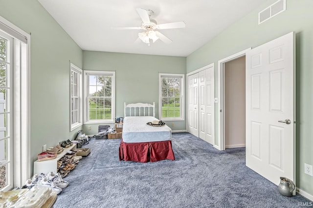 3700 Saint Andrews Pl, Elkhart, IN 46517 - bedroom featuring carpet, baseboards, ceiling fan, and a closet