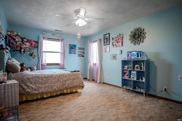 3029 Carroll Rd, Fort Wayne, IN 46818 - carpeted bedroom featuring baseboards and a ceiling fan