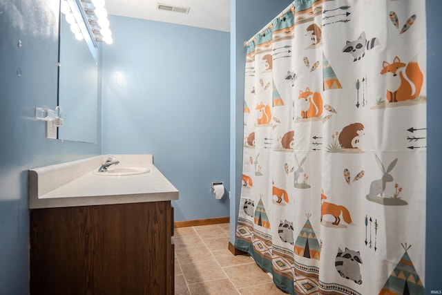 3029 Carroll Rd, Fort Wayne, IN 46818 - full bathroom featuring vanity, baseboards, and a shower with shower curtain