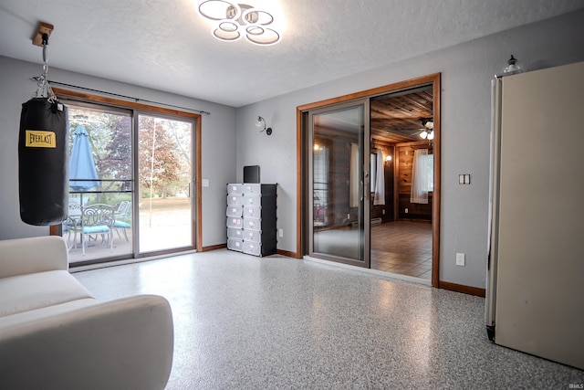 3029 Carroll Rd, Fort Wayne, IN 46818 - living room with a textured ceiling and baseboards