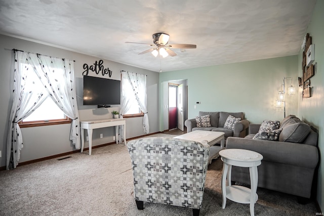 3029 Carroll Rd, Fort Wayne, IN 46818 - carpeted living room with a ceiling fan, plenty of natural light, and baseboards