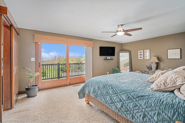 bedroom featuring access to outside, carpet, and a ceiling fan