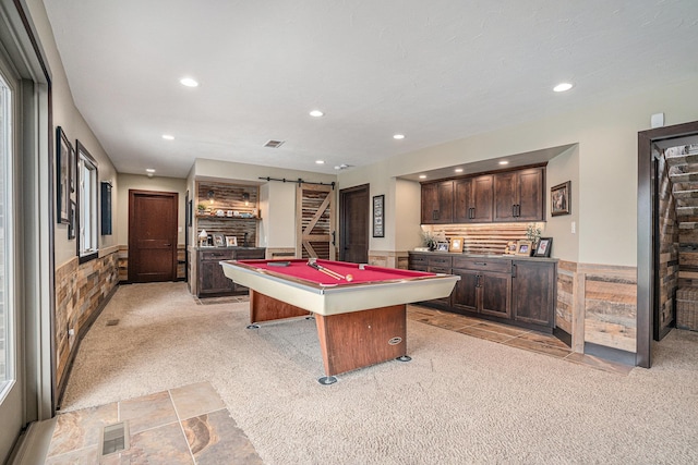 playroom featuring light colored carpet, recessed lighting, billiards, wainscoting, and bar