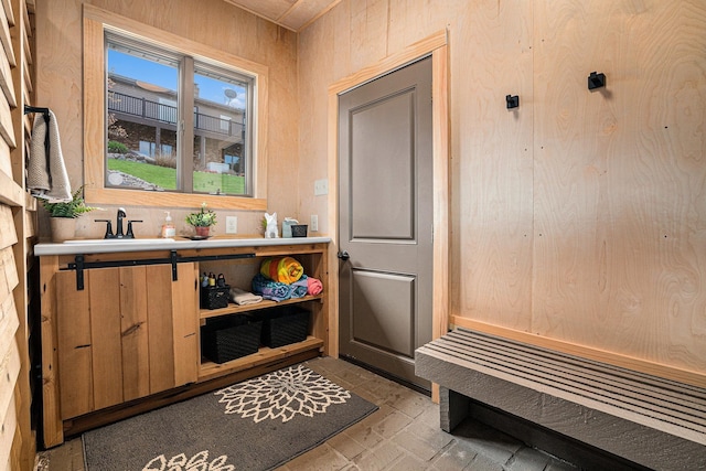 mudroom featuring a sink
