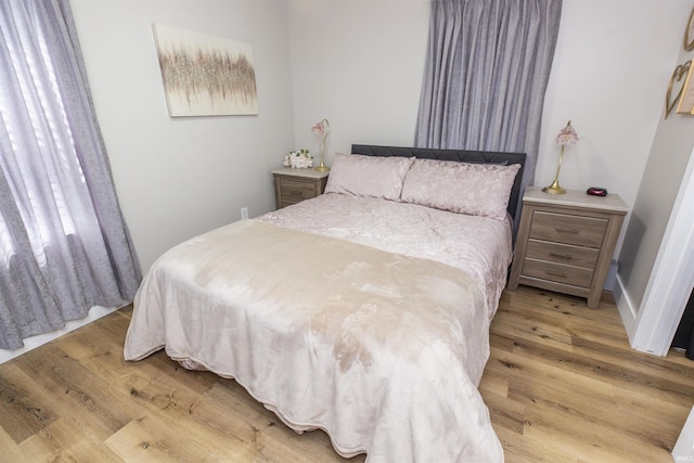 bedroom featuring light wood-type flooring