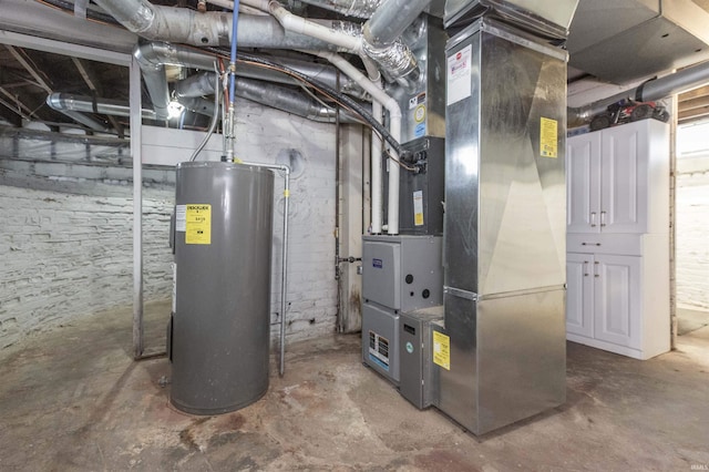 utility room with water heater and heating unit