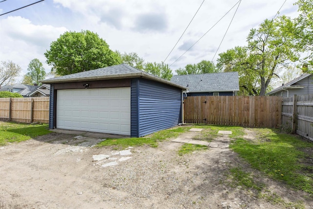 detached garage with fence