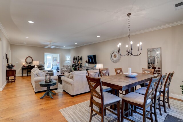 8455 Nolia Ln, Newburgh, IN 47630 - dining area featuring recessed lighting, light wood-style flooring, a chandelier, ornamental molding, and baseboards