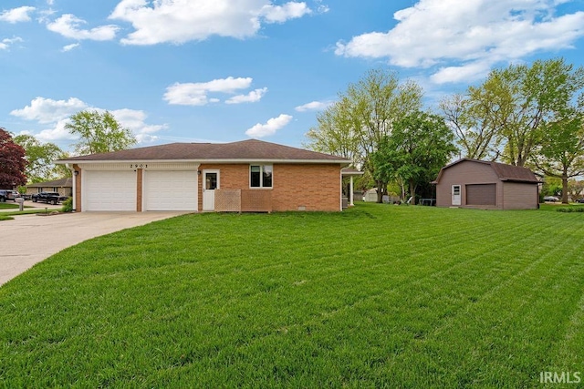 view of front of property featuring a front lawn, driveway, a garage, and brick siding