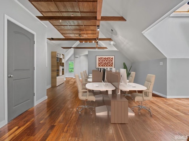 dining space featuring baseboards, wood-type flooring, and wood ceiling