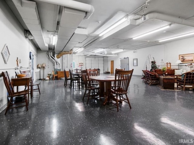 dining room featuring speckled floor