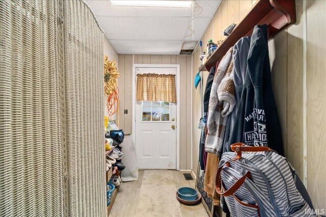 510 W Washington St, Oakland City, IN 47660 - mudroom featuring carpet floors and wood walls