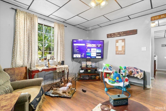 510 W Washington St, Oakland City, IN 47660 - living area featuring wood finished floors and a drop ceiling