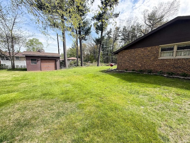 view of yard with an outdoor structure