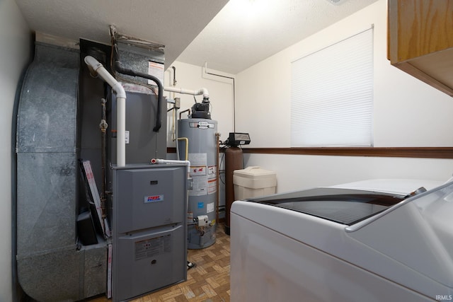 utilities with gas water heater, heating unit, and washing machine and clothes dryer
