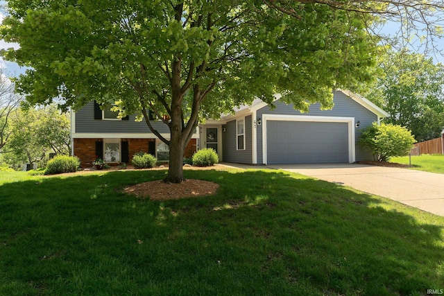 obstructed view of property featuring a garage and concrete driveway