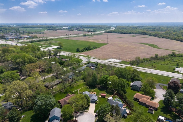 aerial view of property and surrounding area with rural landscape and farmland