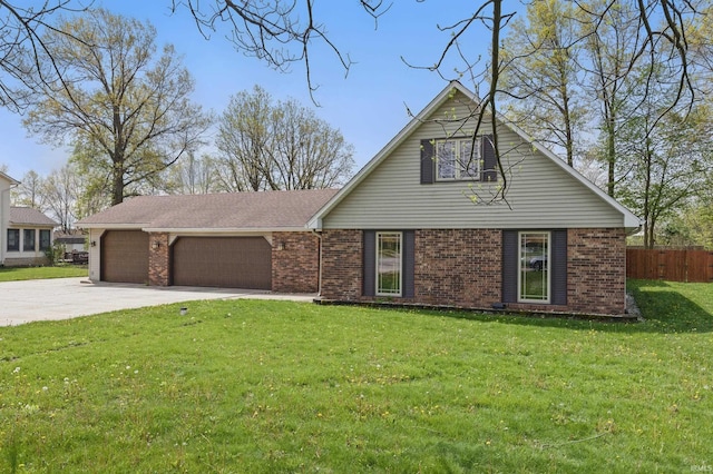 view of front of house with a garage, concrete driveway, and brick siding
