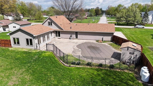 back of property featuring a patio
