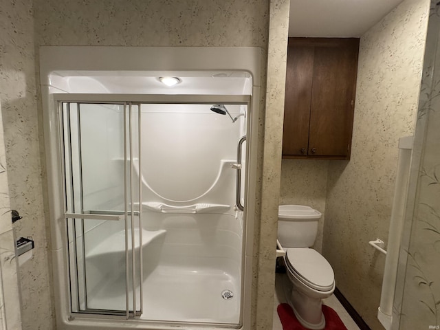 10059 Quince Rd, Plymouth, IN 46563 - bathroom featuring a stall shower and toilet