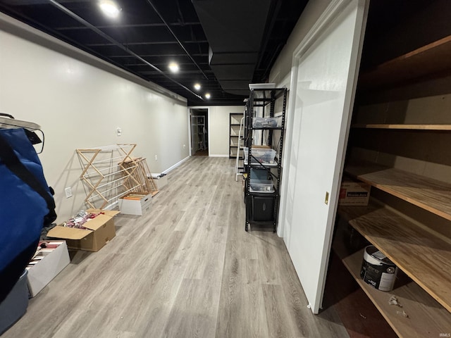 10059 Quince Rd, Plymouth, IN 46563 - corridor with wood finished floors and baseboards