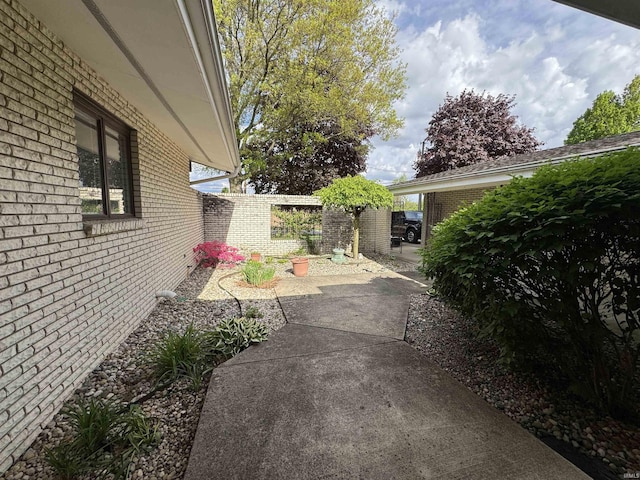 10059 Quince Rd, Plymouth, IN 46563 - view of yard featuring fence and a patio