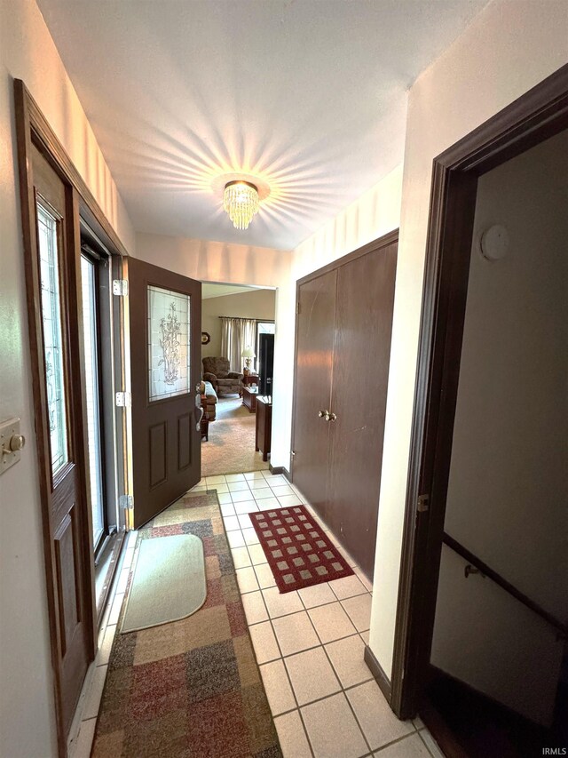 10059 Quince Rd, Plymouth, IN 46563 - corridor featuring light tile patterned floors