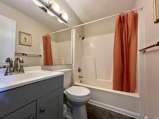 full bath with toilet, vanity, shower / bath combo, and tile patterned flooring