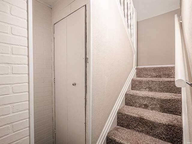 stairway with baseboards