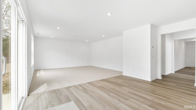 8180 Carlie Ct, Fort Wayne, IN 46818 - spare room with light wood-type flooring and recessed lighting