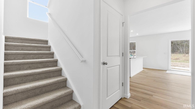 8180 Carlie Ct, Fort Wayne, IN 46818 - staircase featuring wood finished floors and recessed lighting