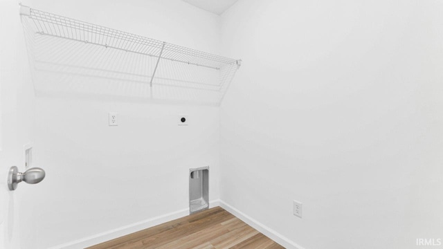 8180 Carlie Ct, Fort Wayne, IN 46818 - laundry room with hookup for an electric dryer and wood finished floors