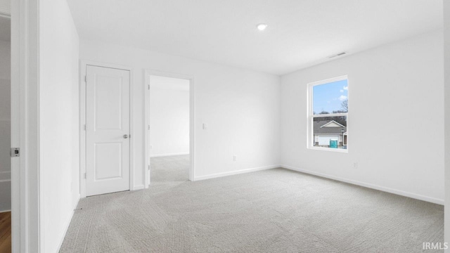 8180 Carlie Ct, Fort Wayne, IN 46818 - unfurnished bedroom with carpet floors and baseboards