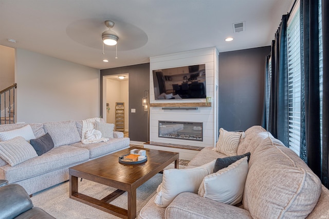 5783 Brookstone Dr, Newburgh, IN 47630 - living room with a ceiling fan, a large fireplace, and recessed lighting