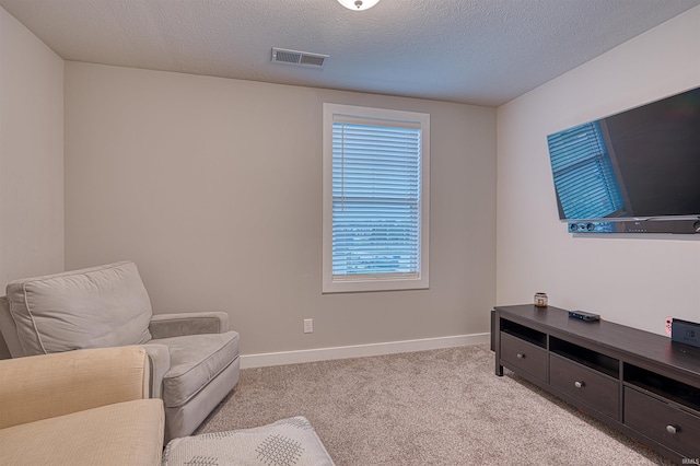 5783 Brookstone Dr, Newburgh, IN 47630 - living area featuring light colored carpet, baseboards, and a textured ceiling